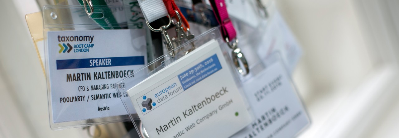 conference badges on strings